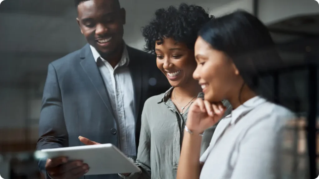 Regulatory affairs professionals reviewing submission documents together during a medical device submission consistency review.